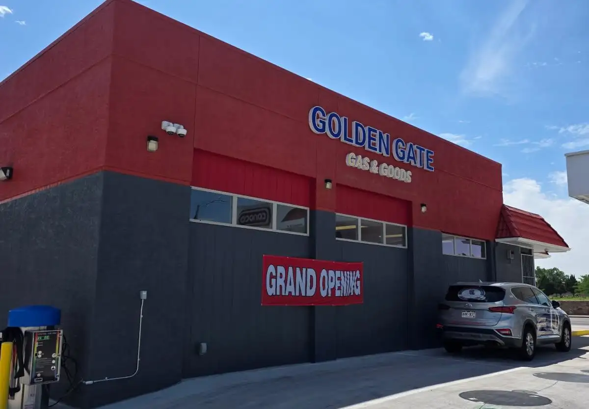 Golden Gate Gas and Goods front side of building with Golden Gate Transportation car outside Golden Gate Gas and Goods front side of building with Golden Gate Transportation car outside