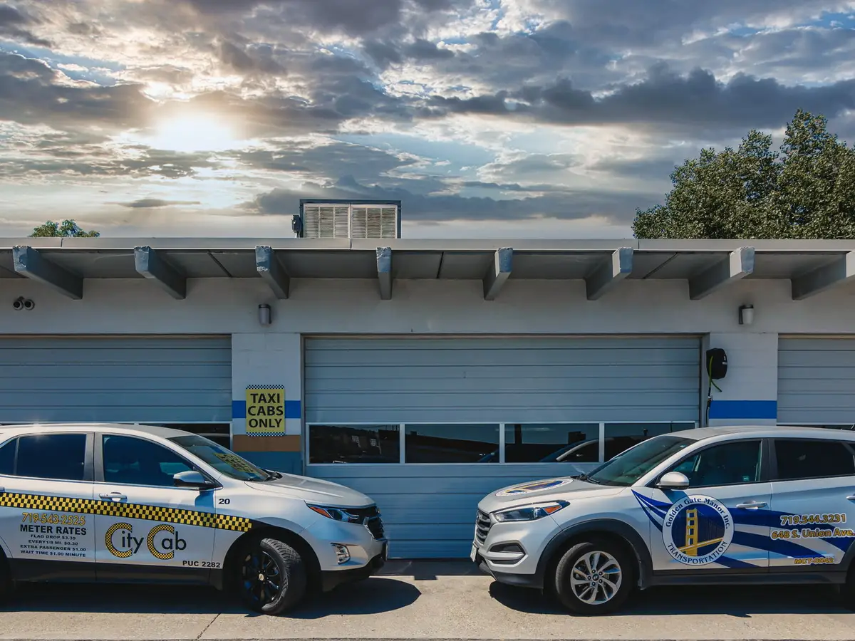 Golden Gate Manor Transportation and City Cab LLC cars next to eachother Golden Gate Manor Transportation and City Cab LLC cars next to eachother.
