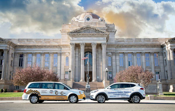 Golden Gate Manor Cars outside Pueblo County Courthouse